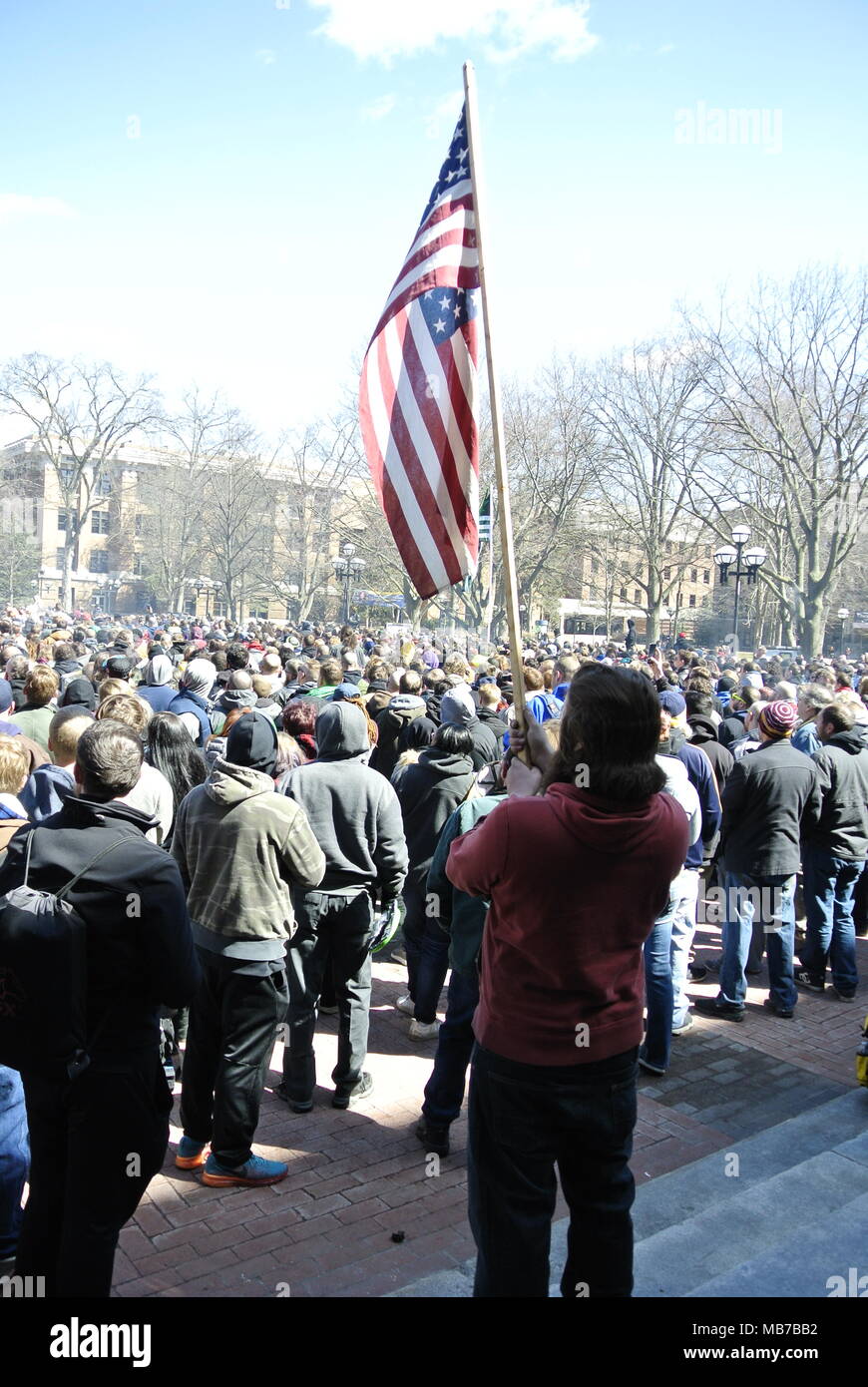 Ann Arbor, Michigan, USA.  7 April 2018. Crowds during the National Anthem at the 47th Annual Hash Bash event.   Credit, Jeffrey Wickett/Alamy Live News. Stock Photo