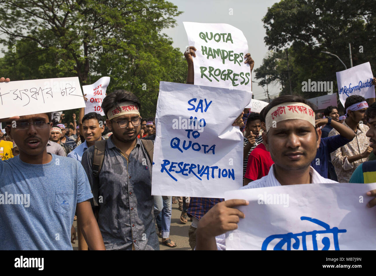 Dhaka, Bangladesh. 8th Apr, 2018. DHAKA, BANGLADESH - APRIL 08 : Hundreds of students and graduates stage demonstrations demanding the existing quota system in government services to be reformed at Shahbag area in Dhaka, Bangladesh on April 08, 2018.Their demands include bringing down the existing 56% quota to 10%, introducing a unified age limit in government services, reviewing the quota system in recruitment processes including Bangladesh Civil Services examinations, filling vacant posts from merit lists if candidates holding quota are not found, and cancellation of the special recruit Stock Photo