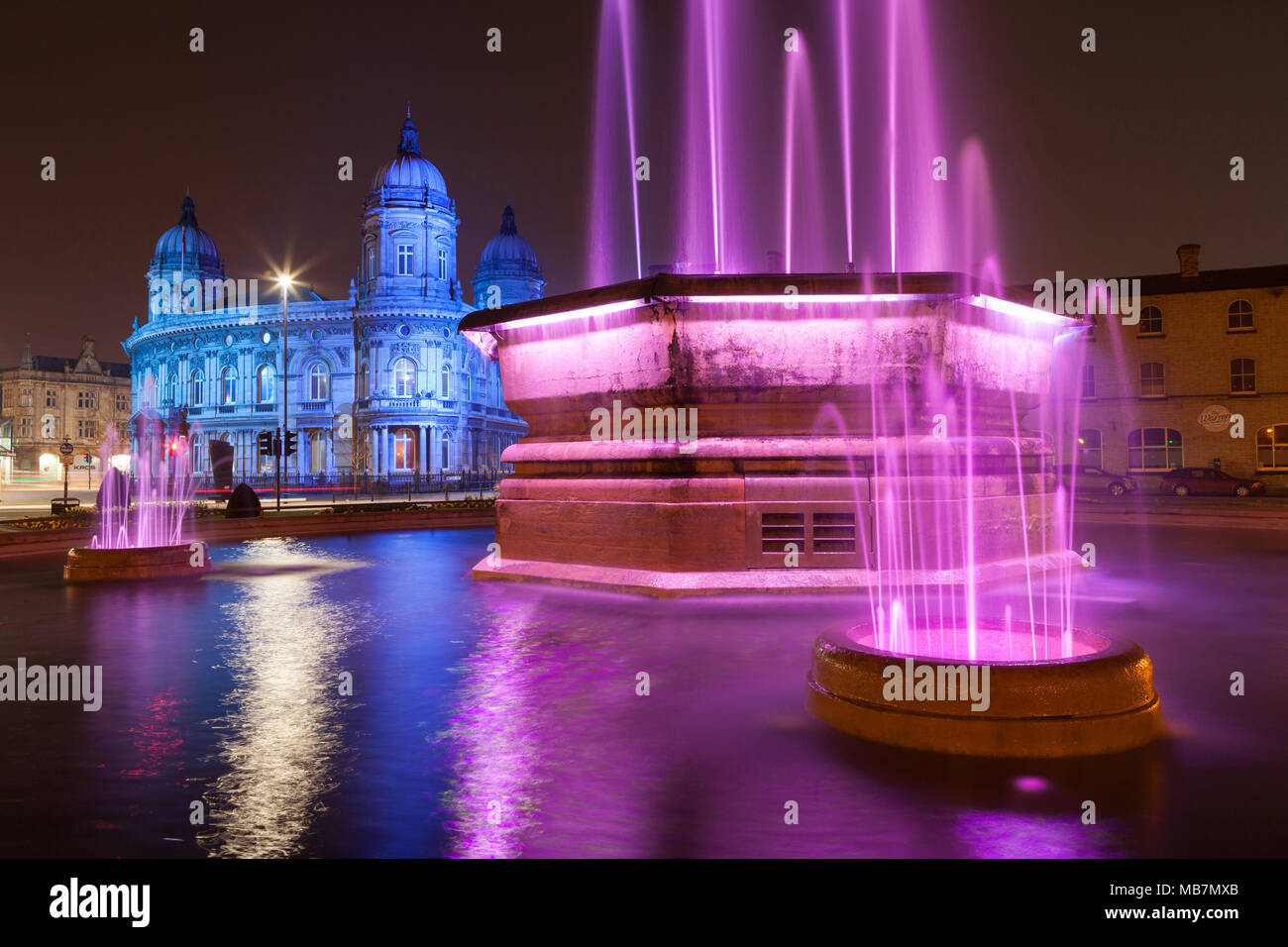 Hull, UK. 7th April, 2018. UK News: Hull's Maritime Museum and Queens Gardens Fountain, illuminated as part of the City's new 'Golden Hour' lighting installation, designed by artist Nayan Kulkarni. Hull, UK City of Culture 2017, East Yorkshire, UK. 7th April 2018. Credit: LEE BEEL/Alamy Live News Stock Photo