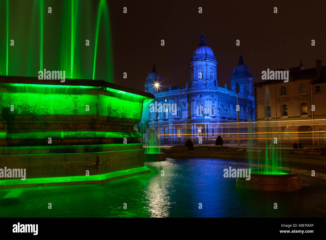 Hull, UK. 7th April, 2018. UK News: Hull's Maritime Museum and Queens Gardens Fountain, illuminated as part of the City's new 'Golden Hour' lighting installation, designed by artist Nayan Kulkarni. Hull, UK City of Culture 2017, East Yorkshire, UK. 7th April 2018. Credit: LEE BEEL/Alamy Live News Stock Photo