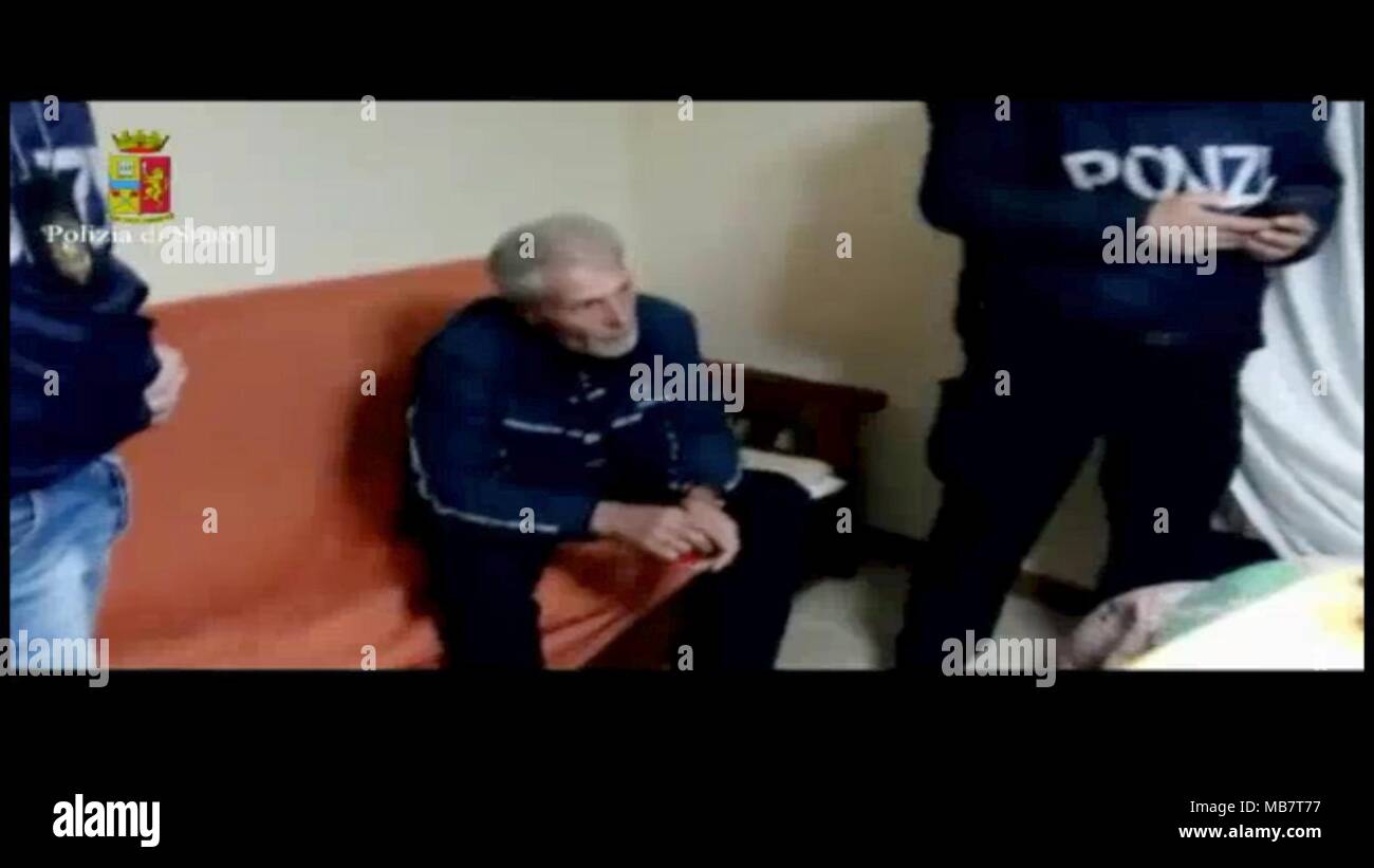 Condofuri, Italy. 06th Apr, 2018. HANDOUT - Undated: A photo released by the Polizia di Stato showing the arrest of mafia boss Giuseppe Pelle, who has been in refuge for two years. Credit: ---/Polizia di Stato/dpa - ATTENTION: editorial use only in connection with the latest coverage about (the transmission/the film/the auction/the exhibition/the book) and only if the credit mentioned above is referenced in full/dpa/Alamy Live News Stock Photo