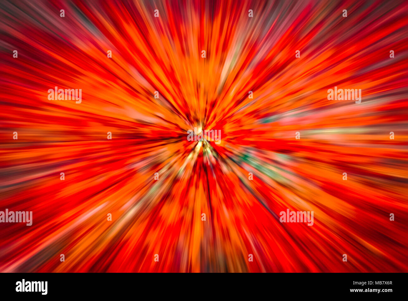 Psychedelic Hypnotic Unrealistic Abstract Speedy Red Background, motion blur effect, zoom motion blur. Stock Photo