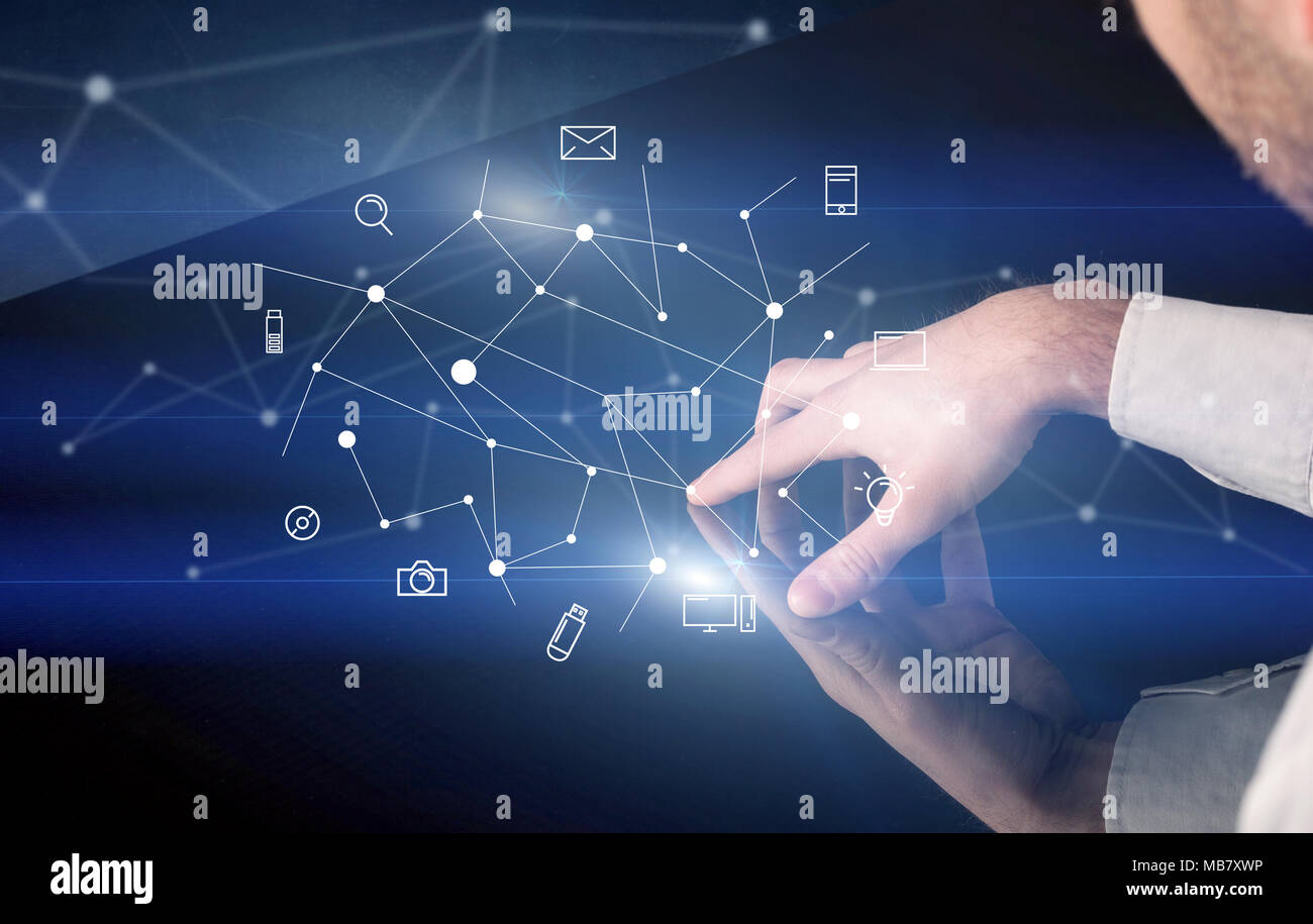 Male hands touching interactive table with blue mixed communication ...
