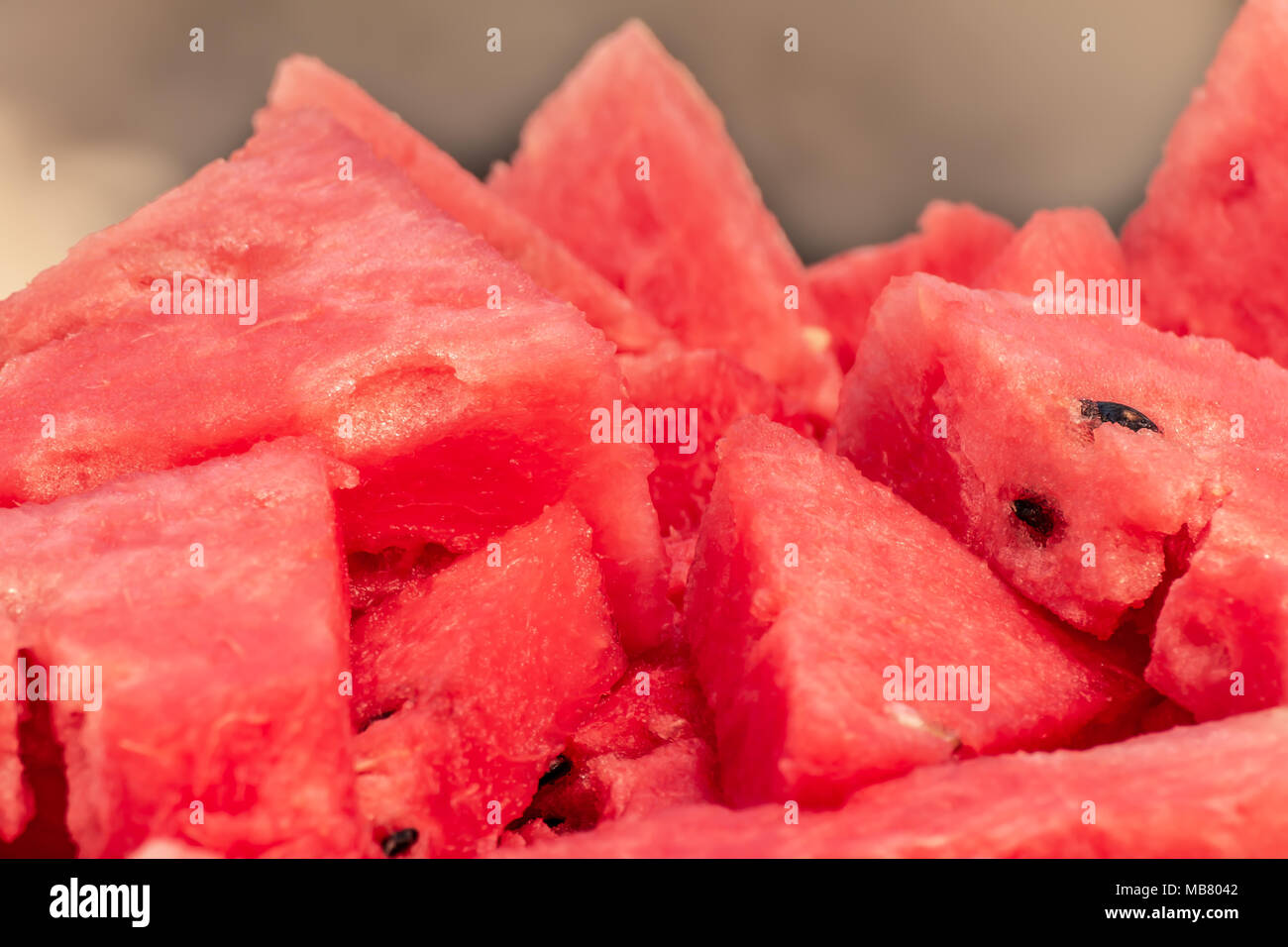 Fresh slices of ripe organic red watermelon, Citrullus lanatus Stock Photo