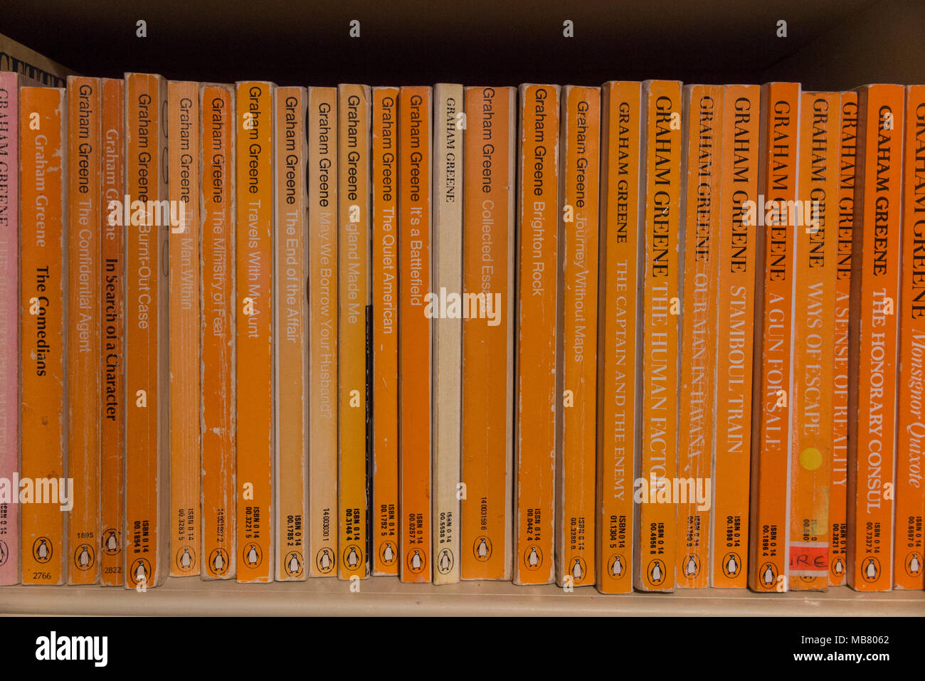A collection of Graham Greene books in a home library Stock Photo
