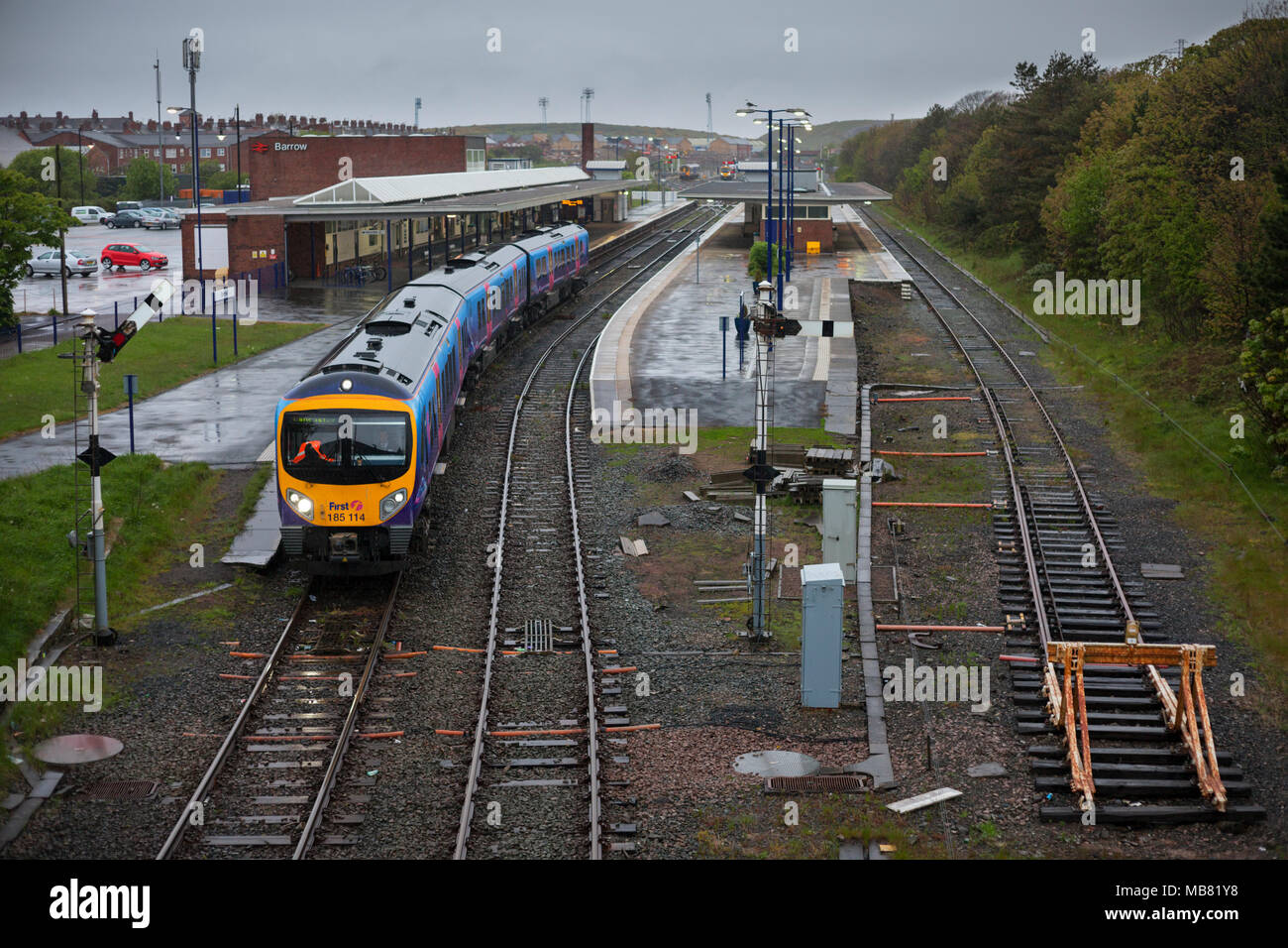 A First Transpennine express class 185 train departing from Barrow In
