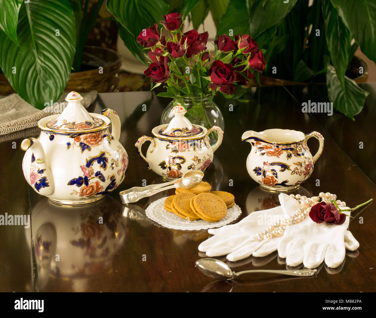 It's time for tea! Elegant porcelain china tea sets displayed for your finest tea party. Stock Photo
