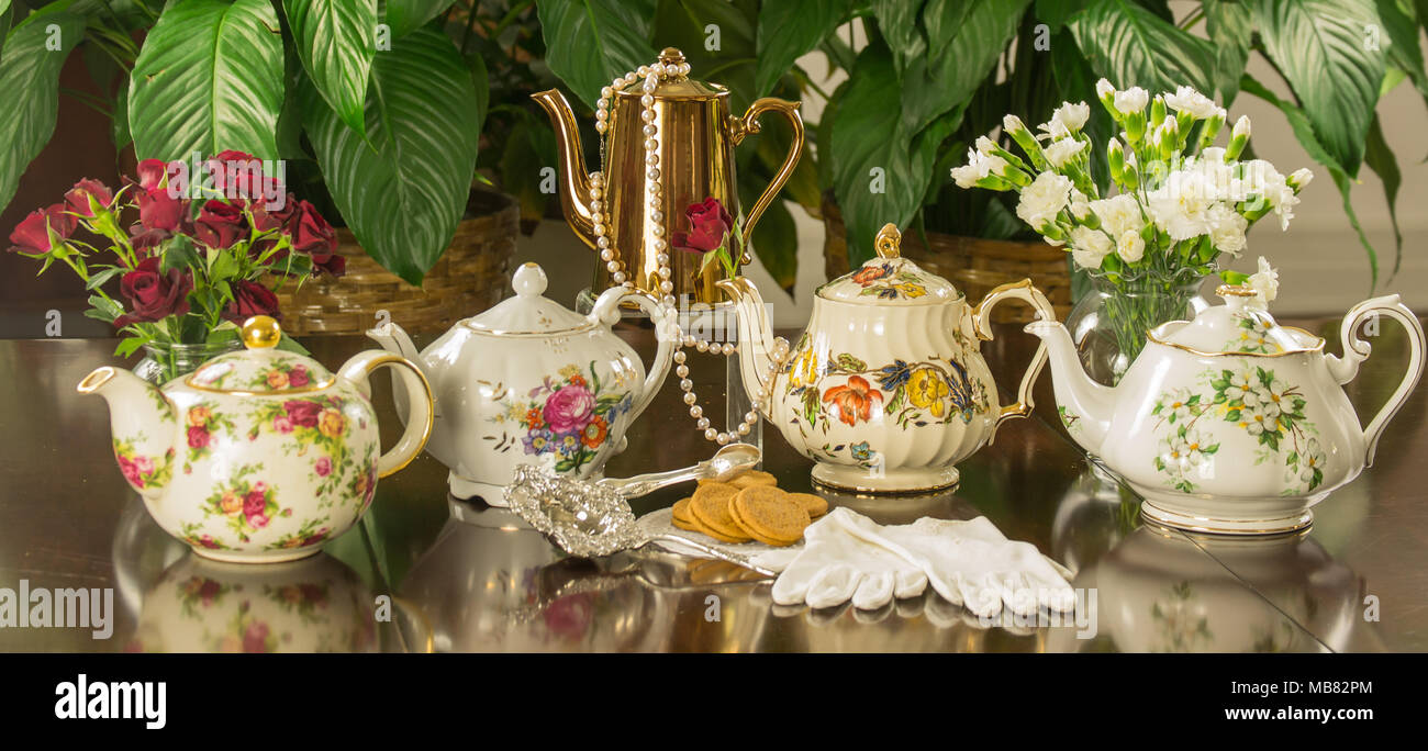 It's time for tea! Elegant porcelain china tea sets displayed for your finest tea party. Stock Photo