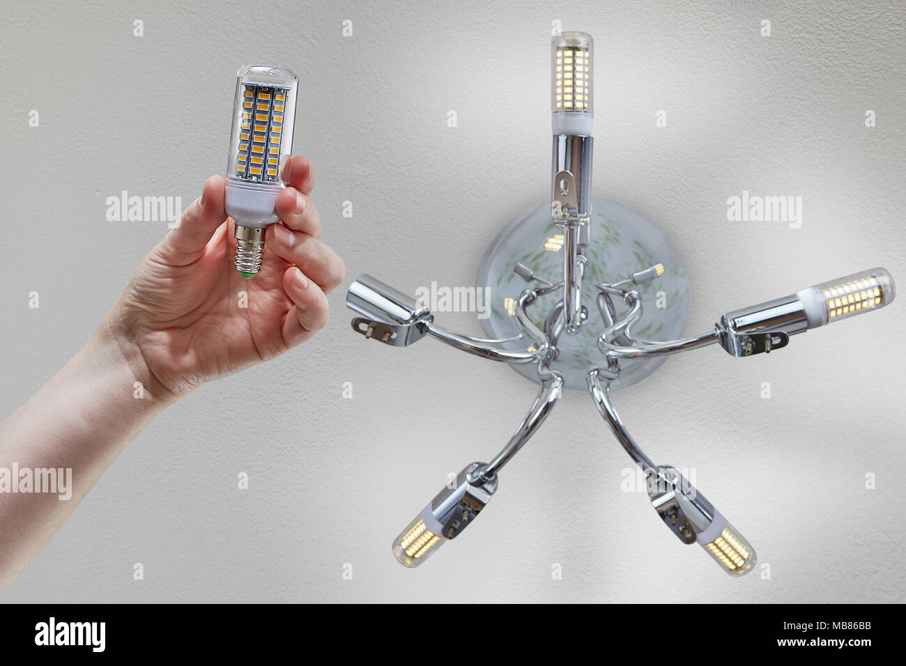 Lamp in the palm of a hand hi-res stock photography and images - Alamy