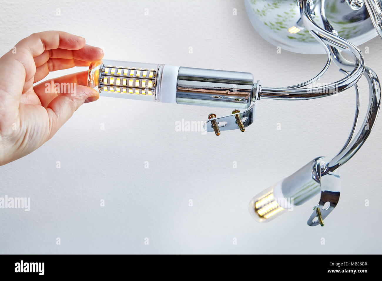 Installation Of Domestic Led Lamps Corn Type In Lampholder Of