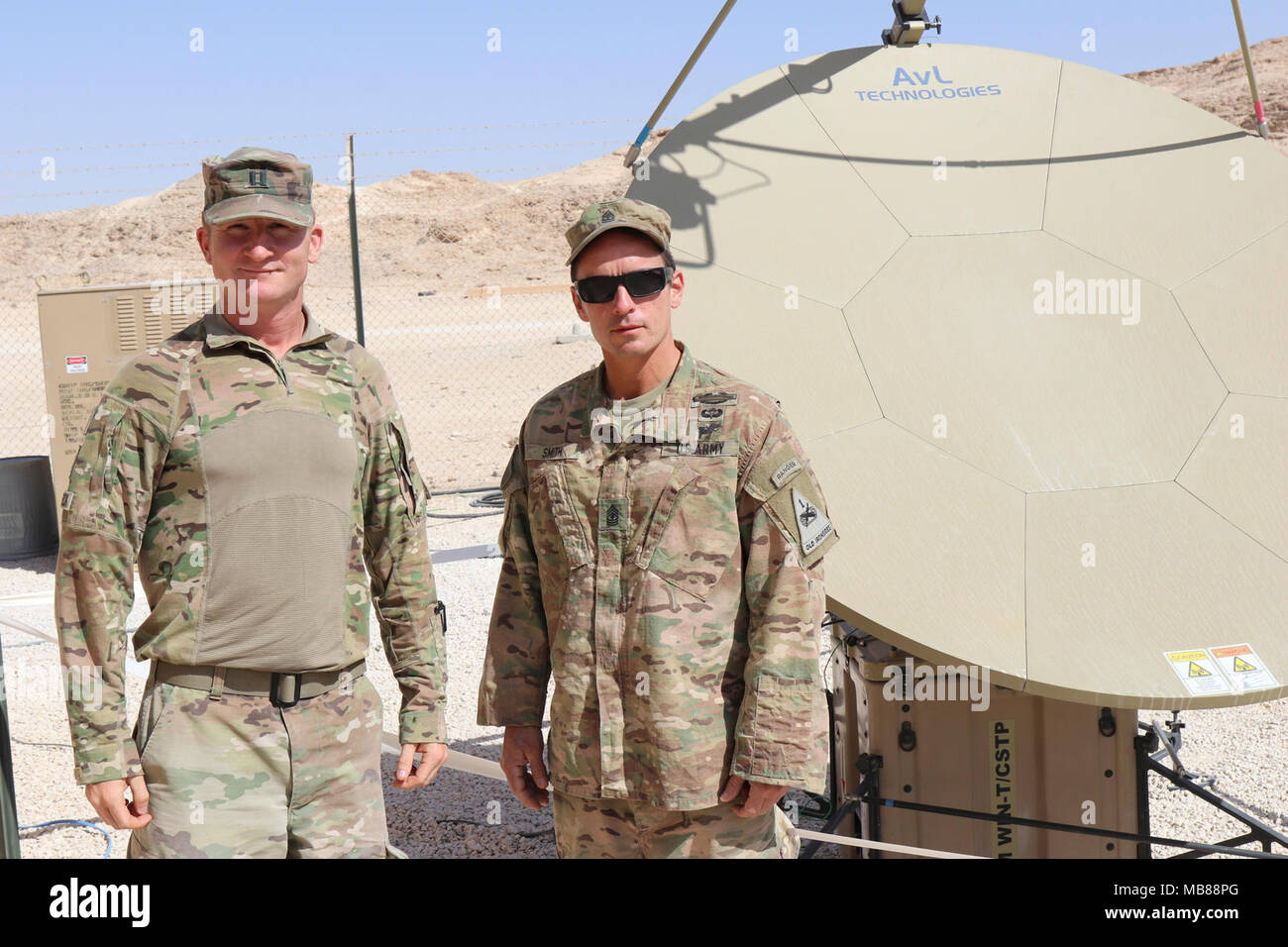 Capt. Stein Thorbeck, left, and 1st Sgt. Charles Smith, company ...