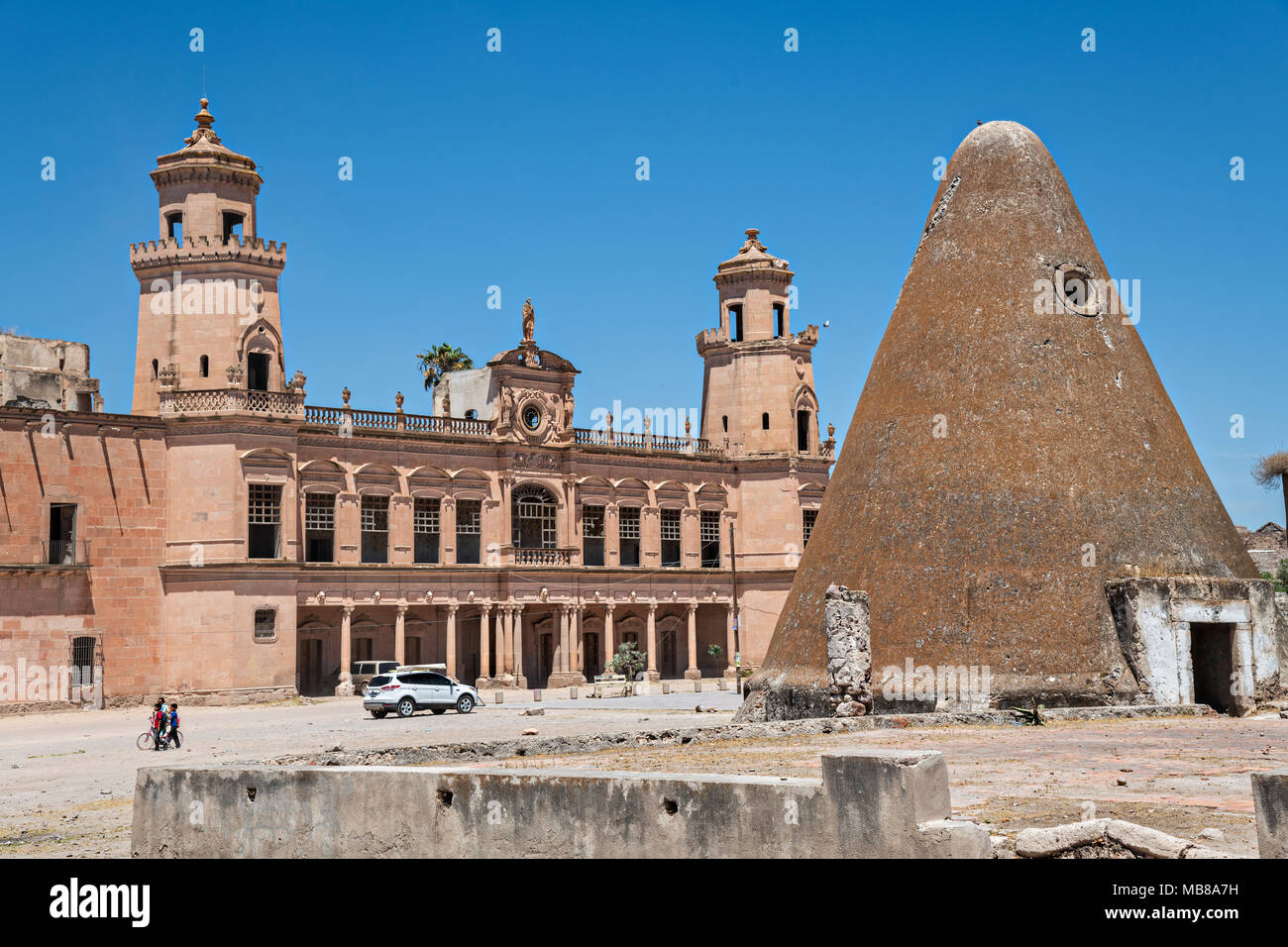 The pyramid shaped granaries and the front towers of the Hacienda de Jaral de Berrio in Jaral de