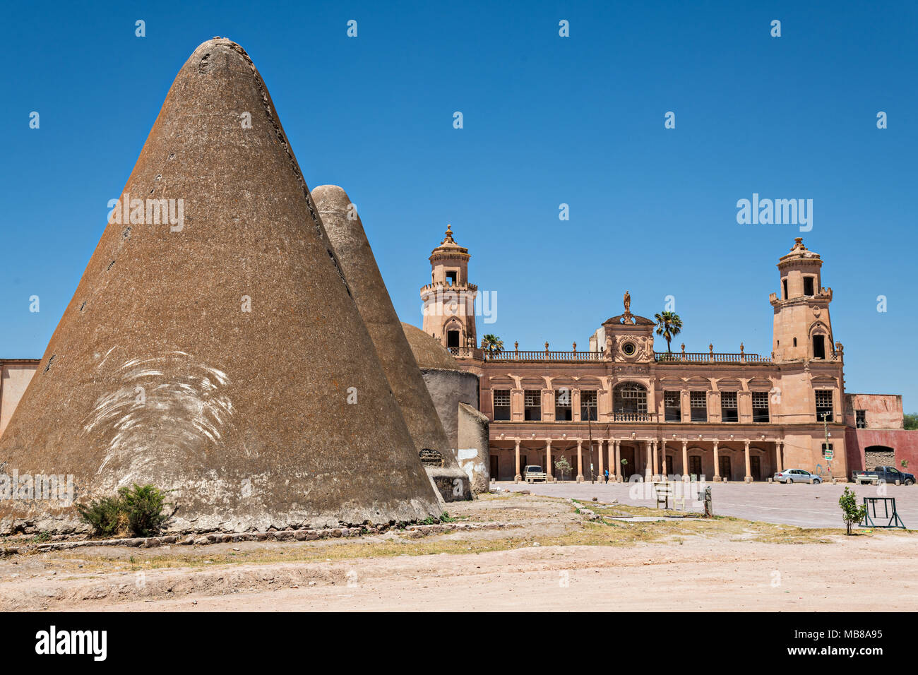 The pyramid shaped granaries and the front towers of the Hacienda de Jaral de Berrio in Jaral de