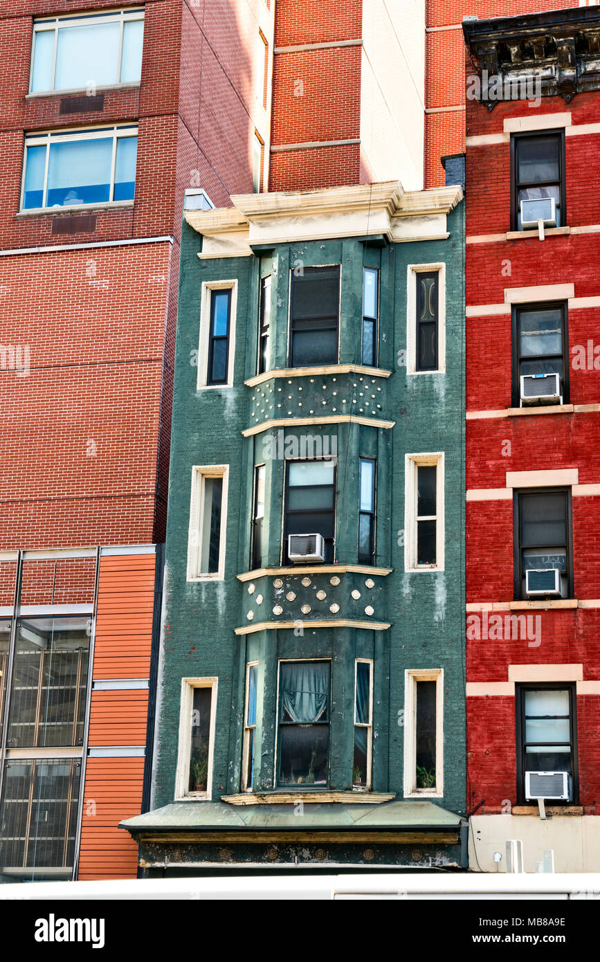 Manhattan, New York City.  Second  Avenue Colorful Painted Tenement Buildings, Partial View, Close-up. Stock Photo