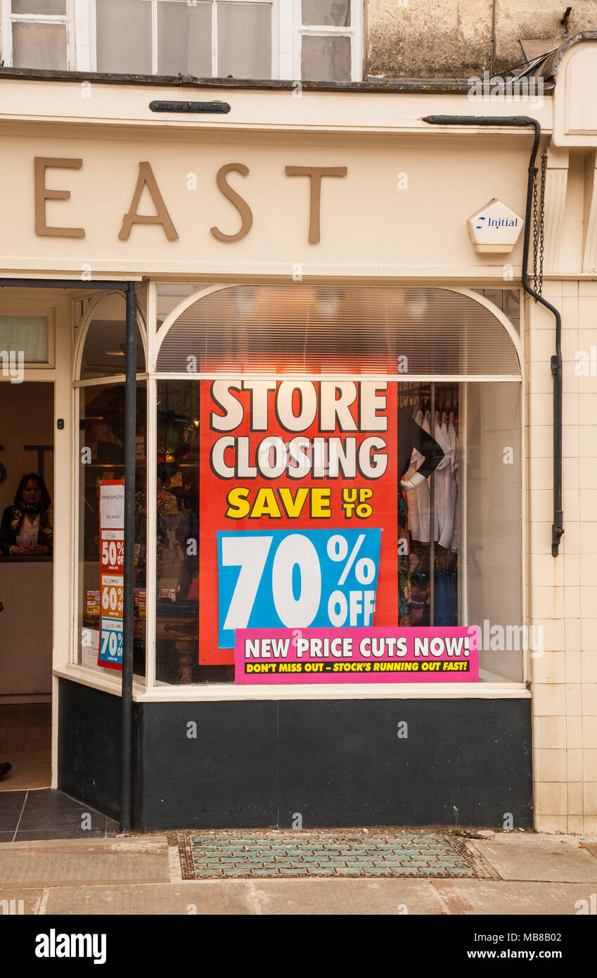 Women's high street fashion chain store East closing down sale due to going bankrupt with all stock reduced to 50% off in shop Stock Photo