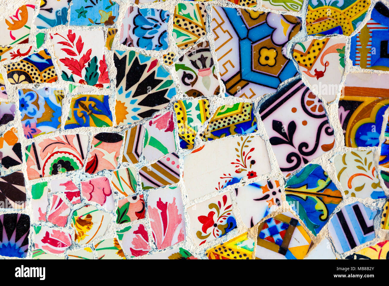 Section of the trencadis (broken tile mosaic) at Antoni Gaudi's Park Guell in Barcelona, Spain Stock Photo