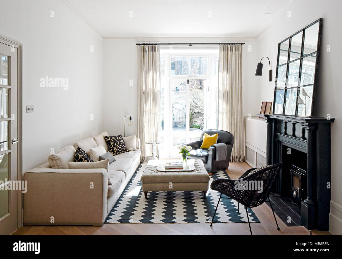 Living Room With Full Height Window And Fireplace Private
