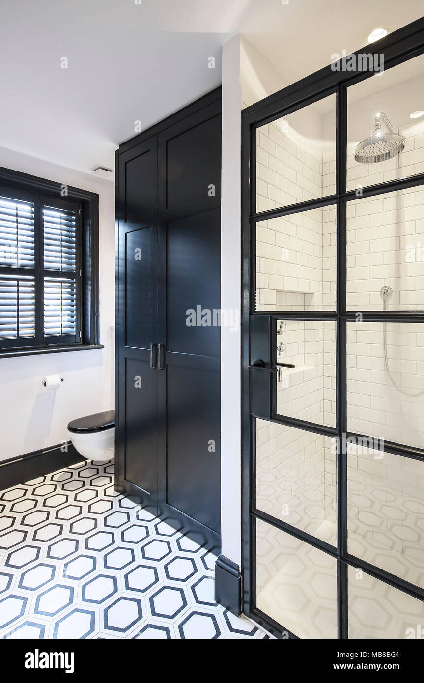 Bathroom with shower and toilet. Private residence, London, United