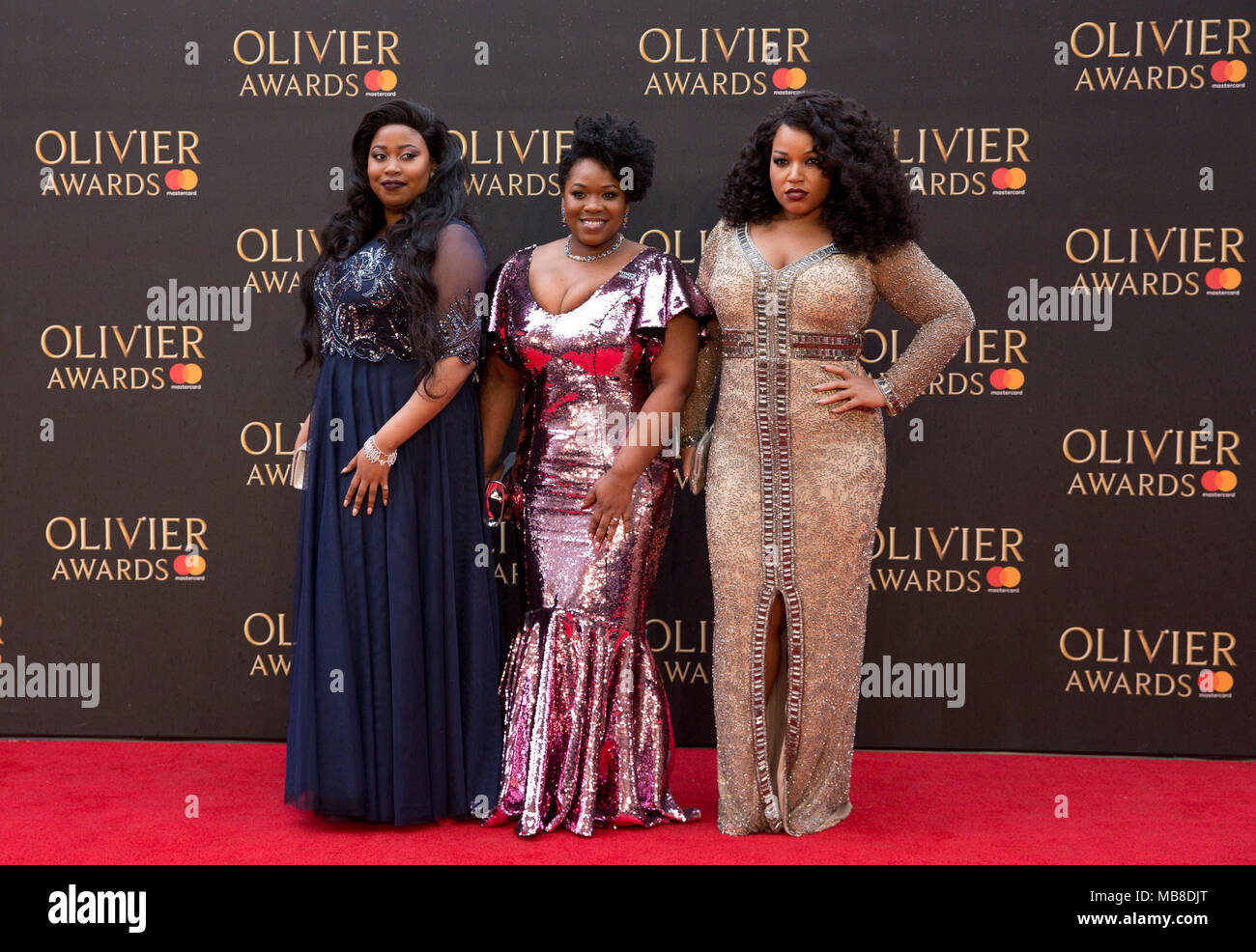 Moya Angela, Karen Mav and Marisha Walla arriving for The Olivier Awards at the Royal Albert Hall in London. Stock Photo