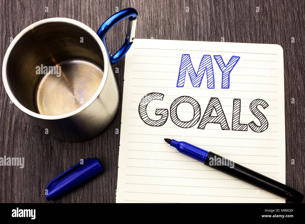 Conceptual hand writing showing My Goals. Business photo showcasing Goal Aim Strategy Determination Career Plan Objective Target Vision written Notebo Stock Photo