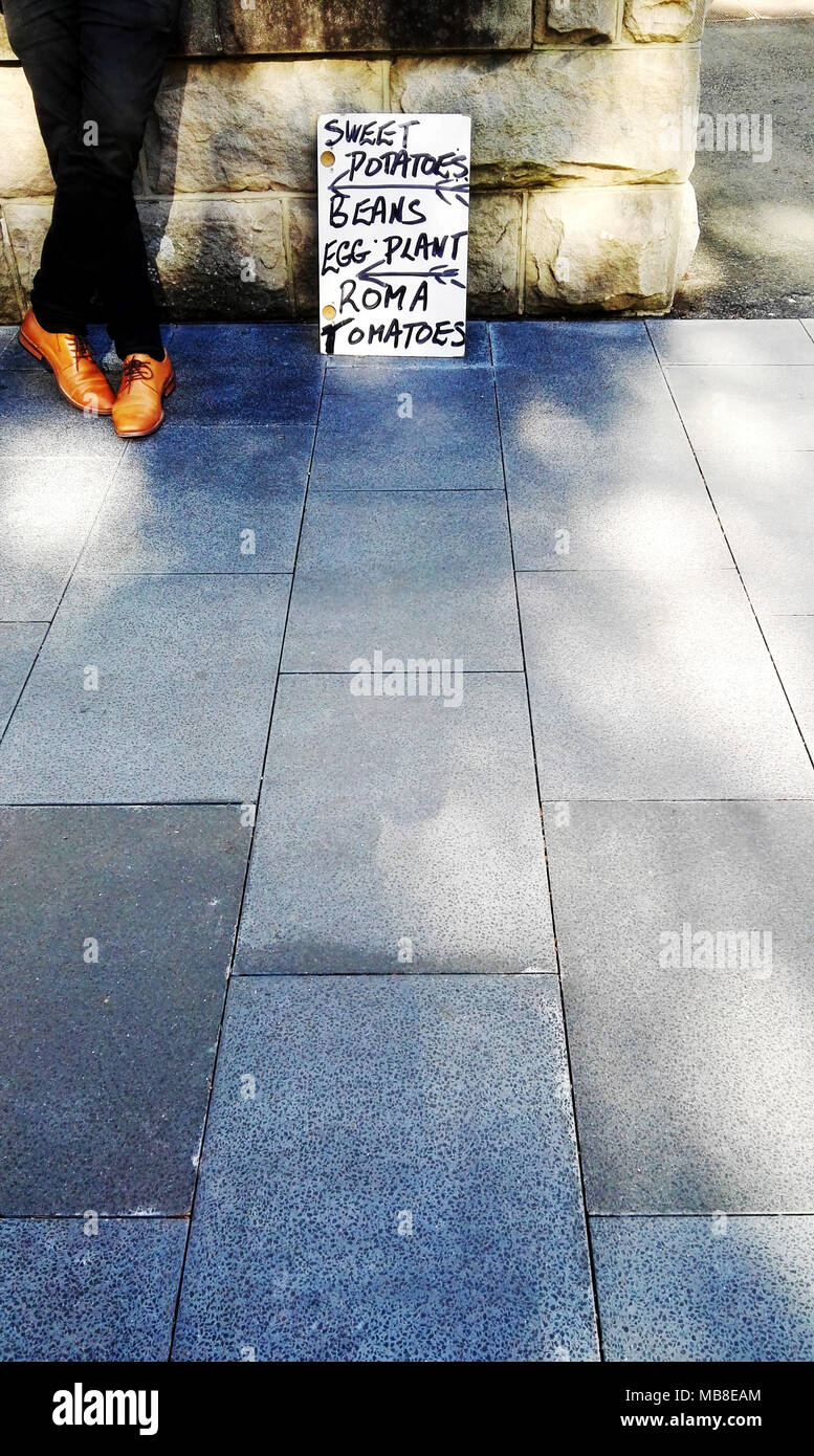 Crossed legs standing hi-res stock photography and images - Alamy