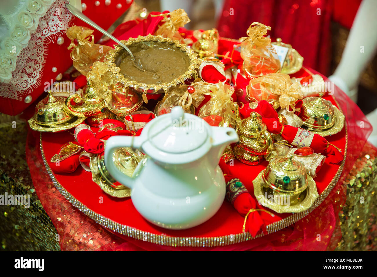 Mixing henna for hair. Natural henna color mixed pasted in a bowl Stock Photo Alamy