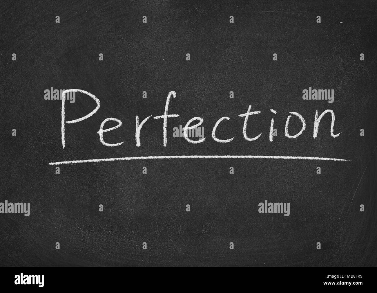 perfection concept word on a blackboard background Stock Photo
