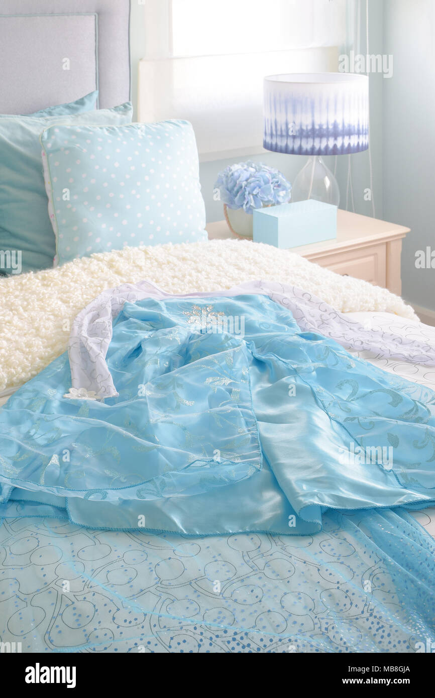 Light Blue Princess Dress On Bed In Light Blue Interior Bedroom