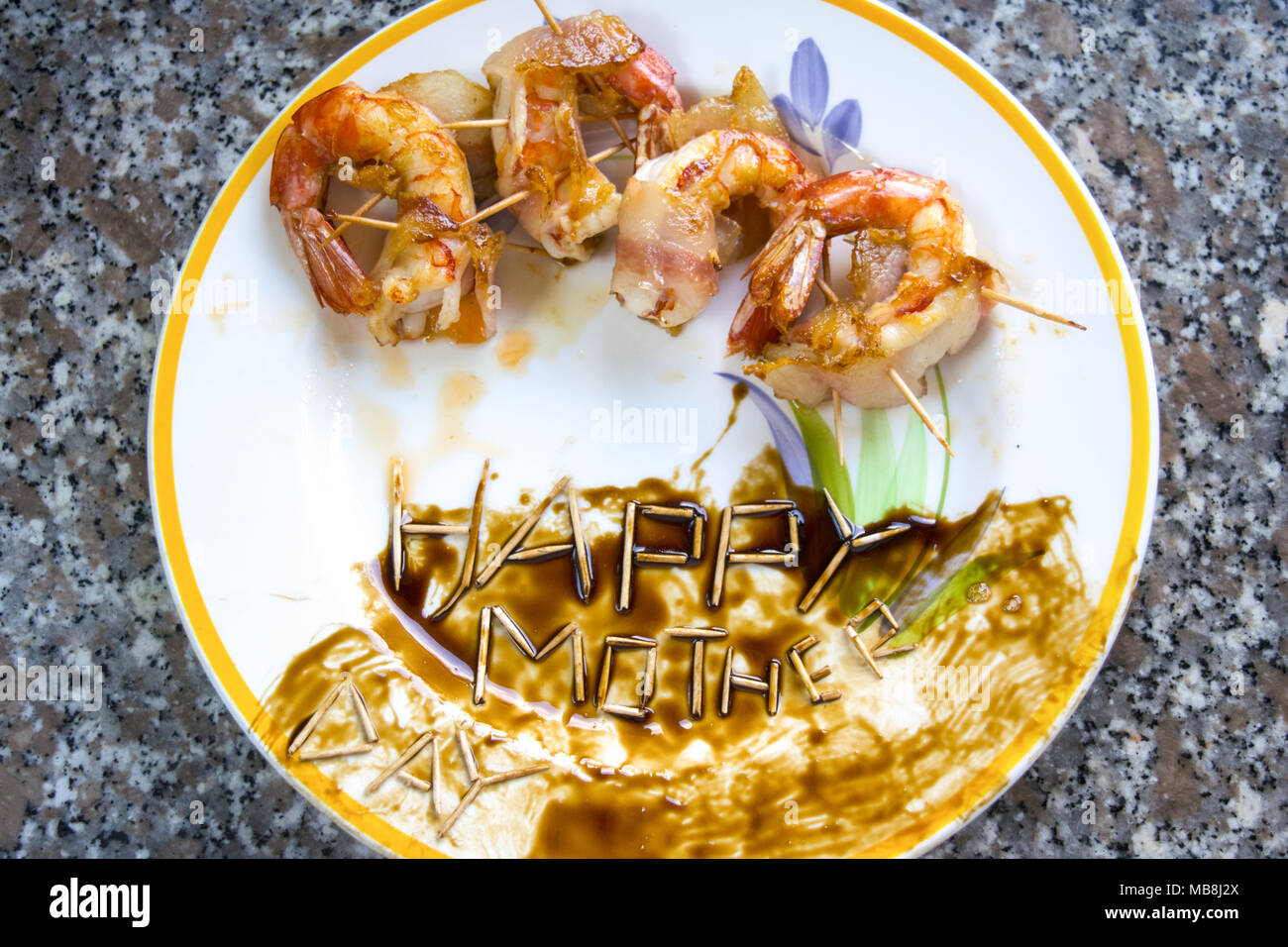 dish of prawn roulades with the written happy mother day Stock Photo