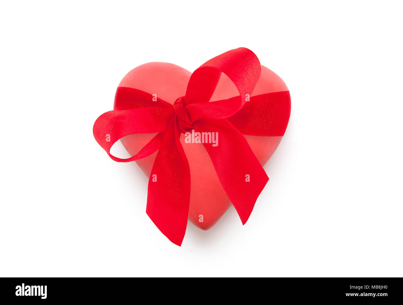 Red heart with red ribbon isolated on white background Stock Photo