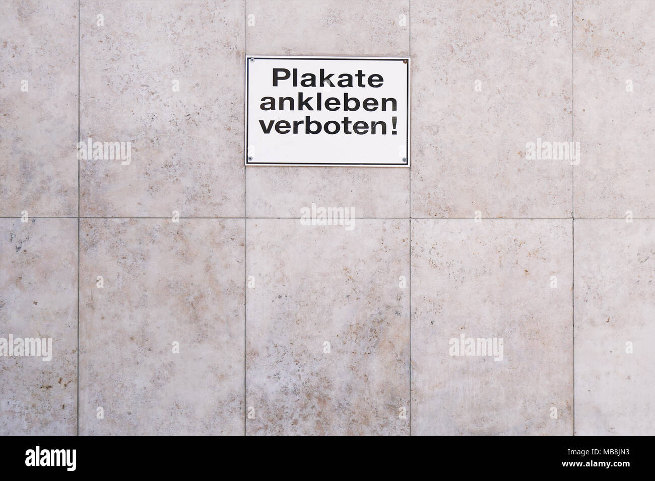 German sign Plakate ankleben verboten translates as post no bills Stock Photo