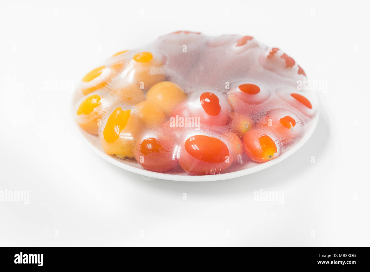 https://c8.alamy.com/comp/MB8KDG/fruits-that-are-wrapped-with-plastic-film-preservation-to-maintain-the-freshness-of-the-fruit-MB8KDG.jpg