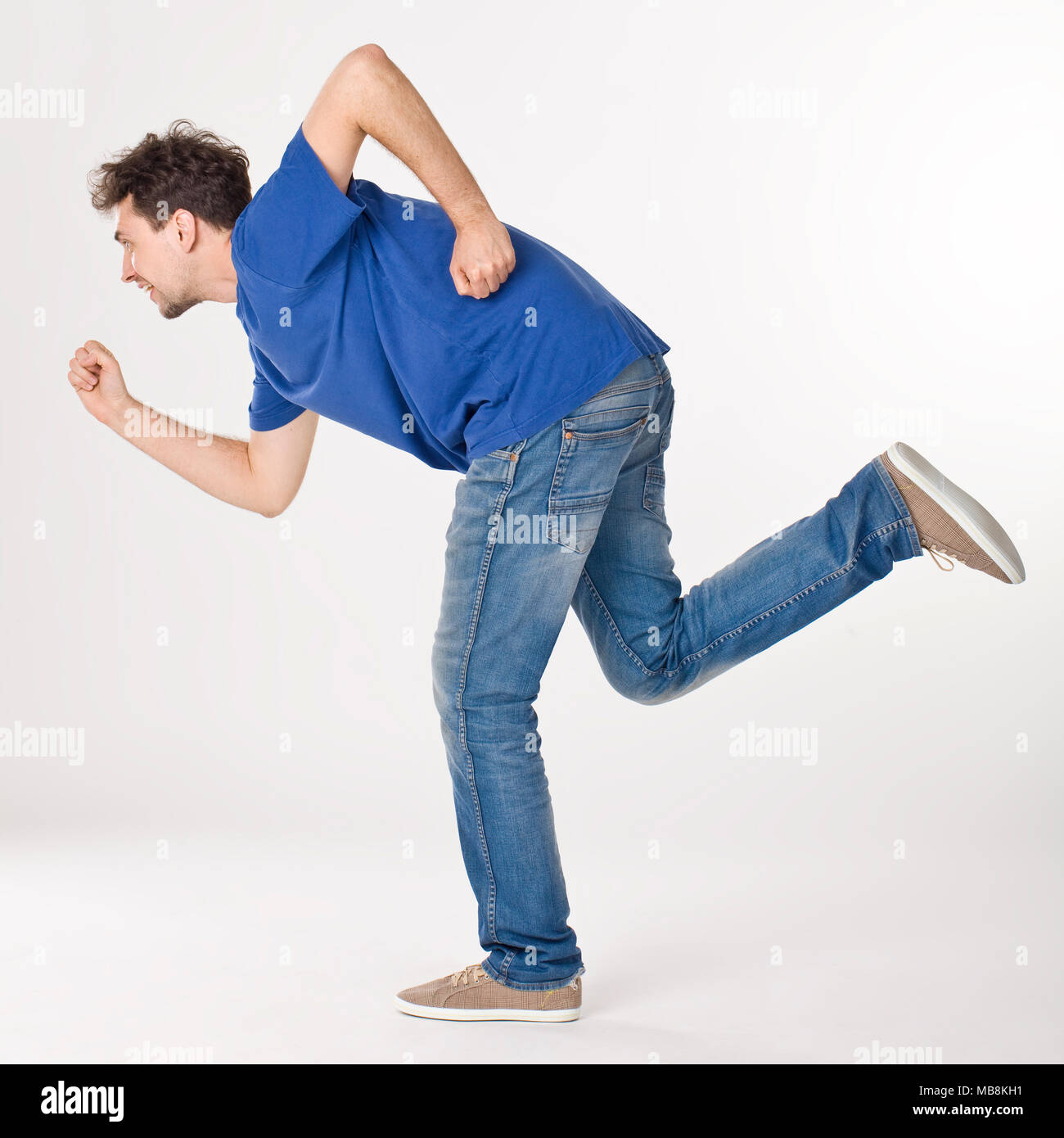 Man running away jeans hi-res stock photography and images - Alamy