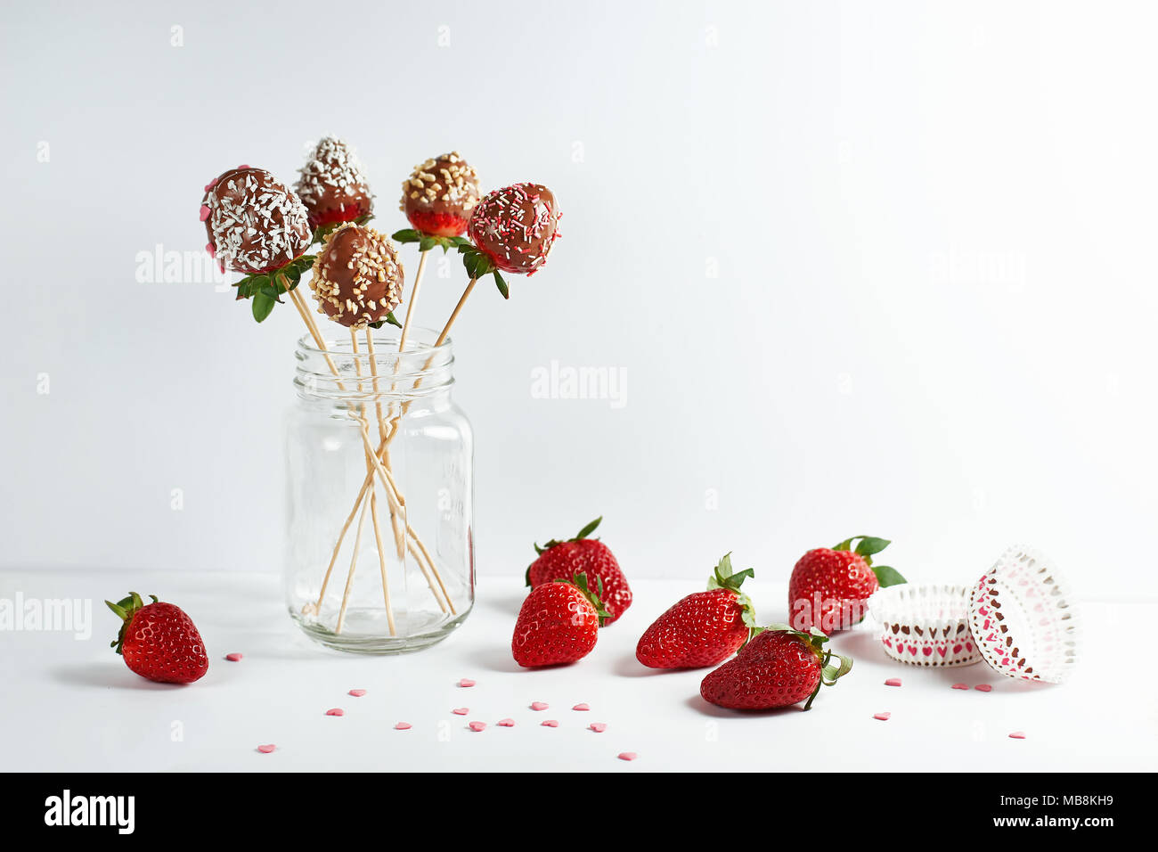 Still life of strawberries in chocolate Stock Photo - Alamy