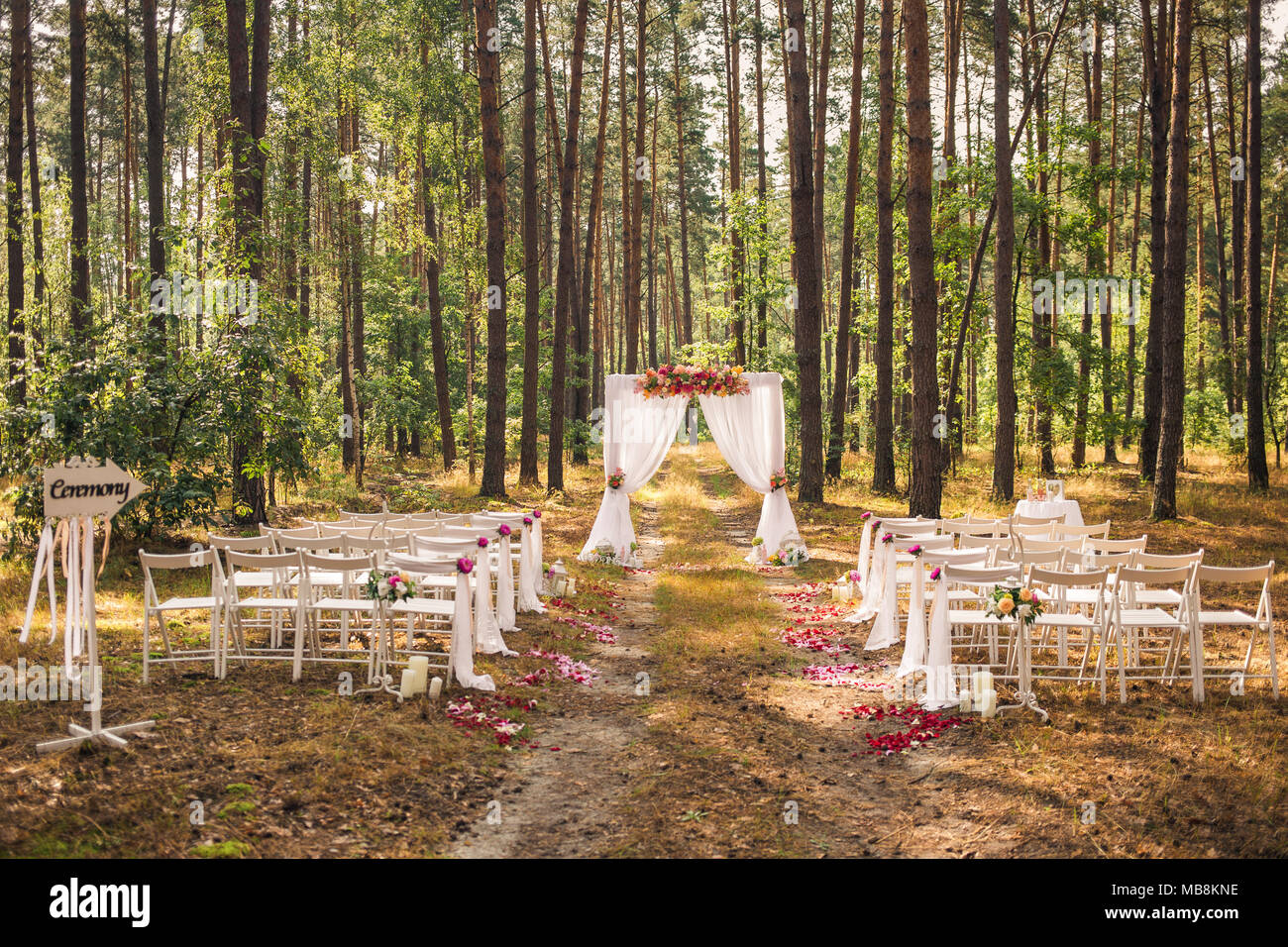 Beautiful elegant wedding decorations of place for ceremony outside in ...