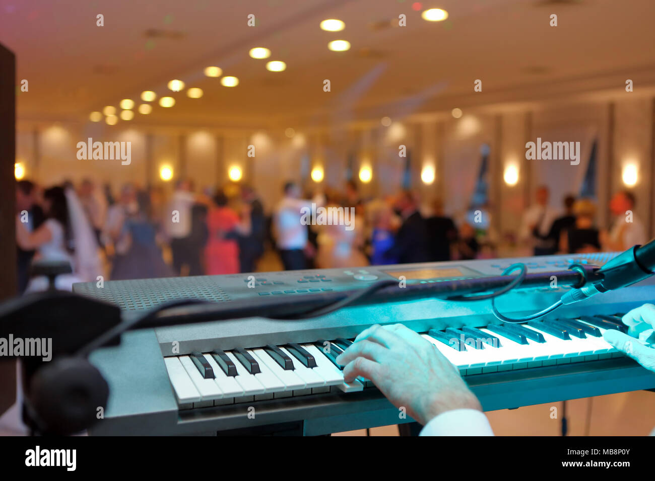 Dancing couples during party or wedding celebration Stock Photo