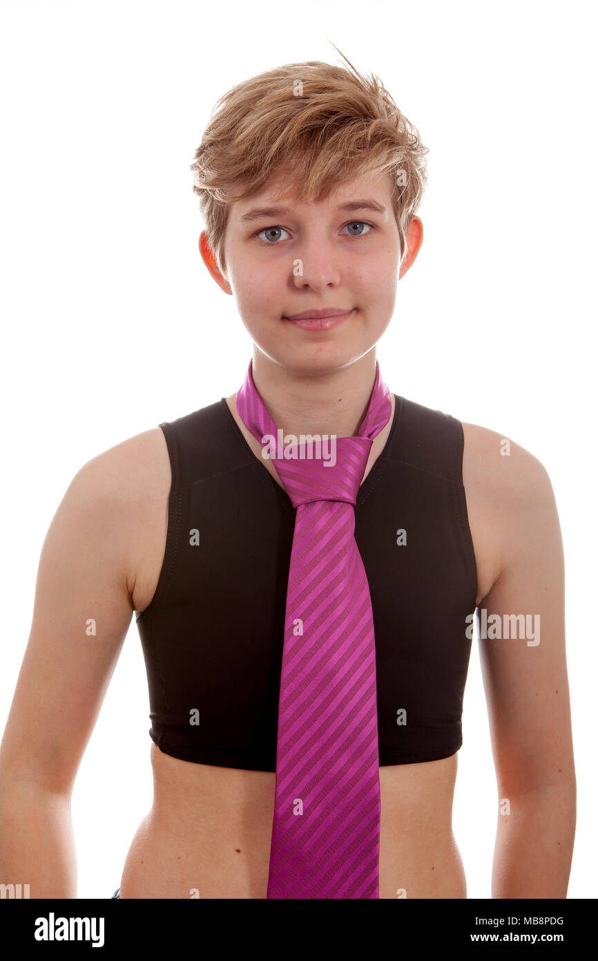 Transgender boy is wearing binder and pink neck tie over white