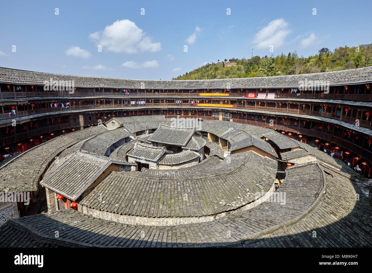 The Fujian tulou (Chinese: 福建土楼; literally: 'Fujian earthen buildings') are Chinese rural dwellings unique to the Hakka in the mountainous areas in so Stock Photo
