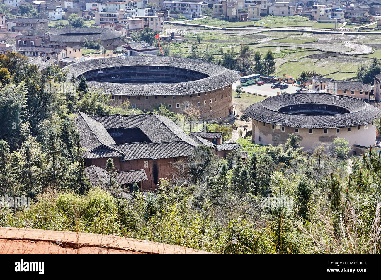 The Fujian tulou (Chinese: 福建土楼; literally: 'Fujian earthen buildings') are Chinese rural dwellings unique to the Hakka in the mountainous areas in so Stock Photo