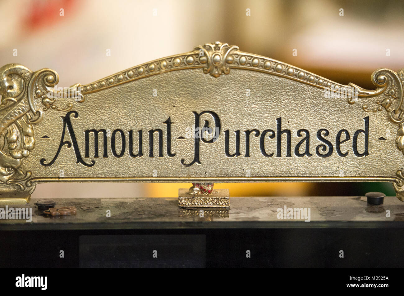 Amount purchased sign on old cash register. Stock Photo