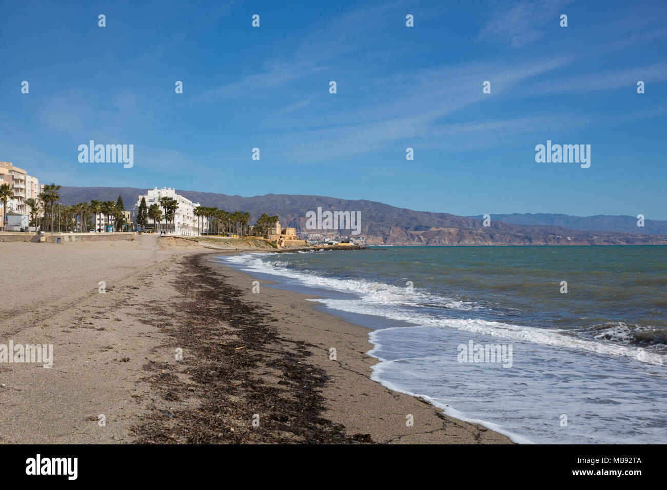 Roquetas del Mar beach Costa de Almería, Andalucía Spain view towards the castle and lighthouse Stock Photo