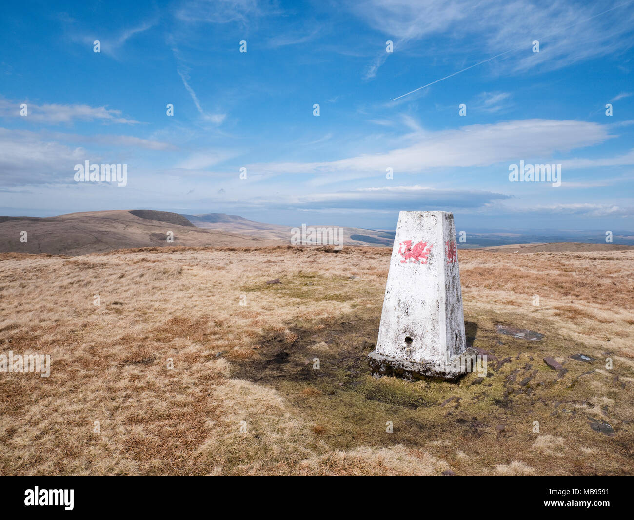 View from the trig pillar on Fan Nedd summit to Fan Gyhirych and the distant Carmarthen Fans, Fforest Fawr, Brecon Beacons National Park, UK Stock Photo