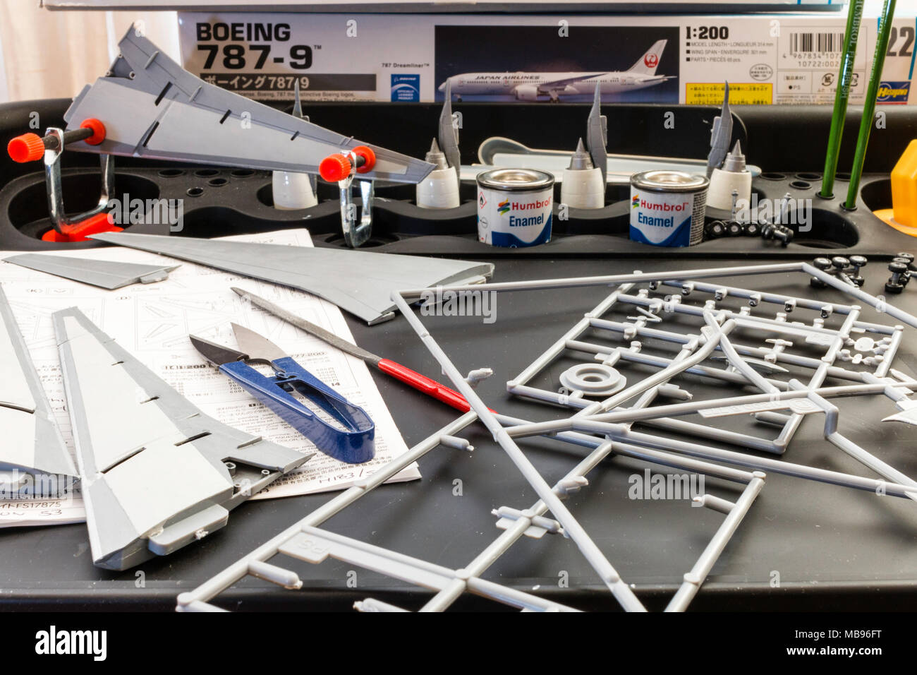 England. Hasagawa Boeing airplane hobby kits, model pieces arranged on