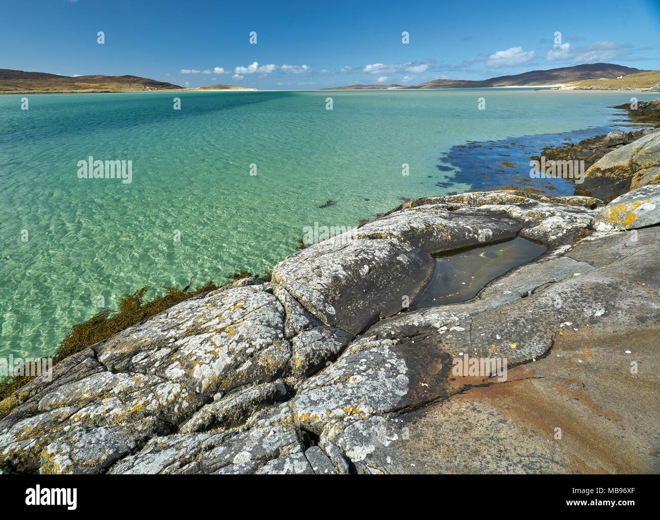 Stunning tropical colours in the crystal clear sea around Luskentyre on The Isle of Harris, Scotland. Stock Photo