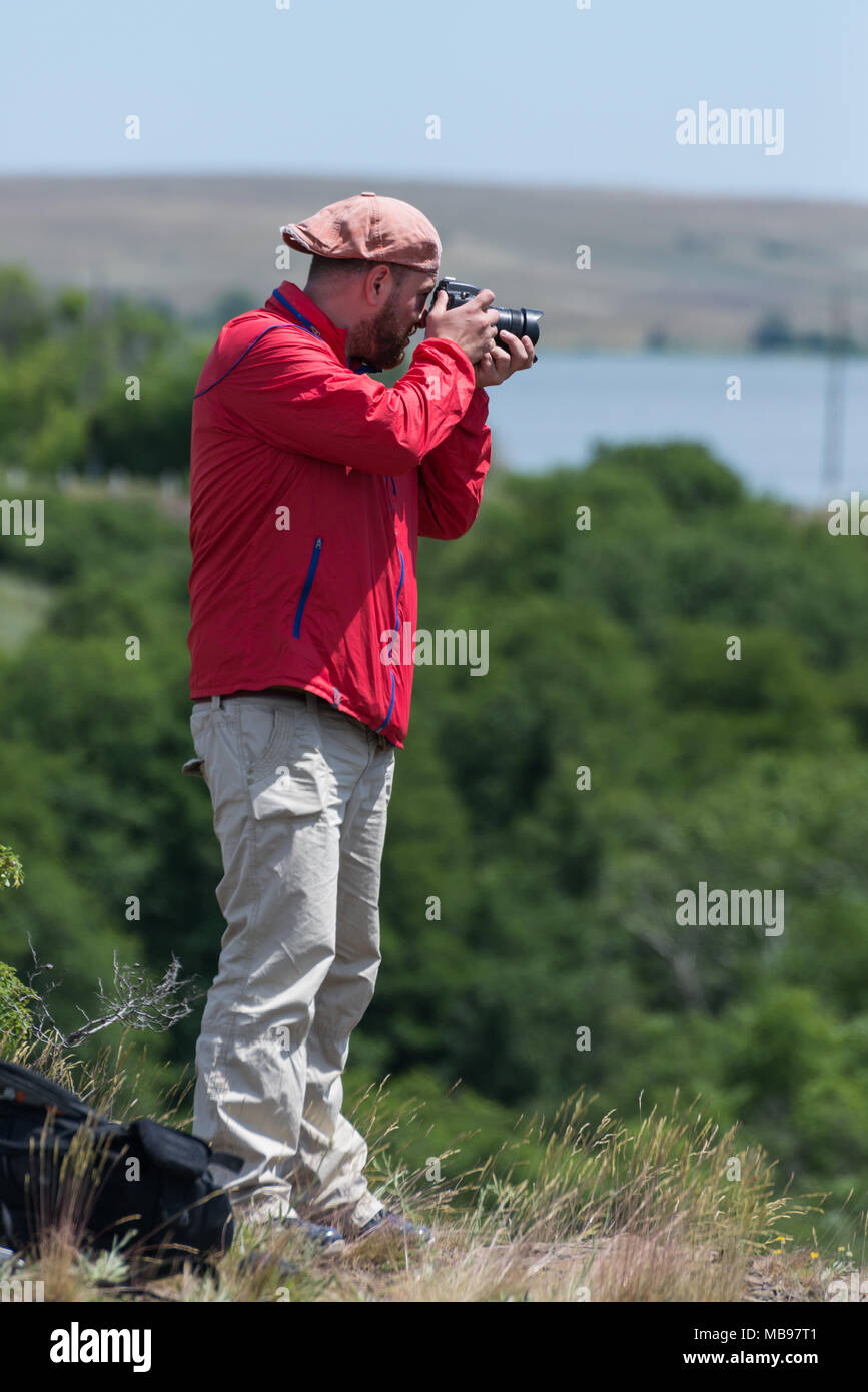 Male photographer at work Stock Photo