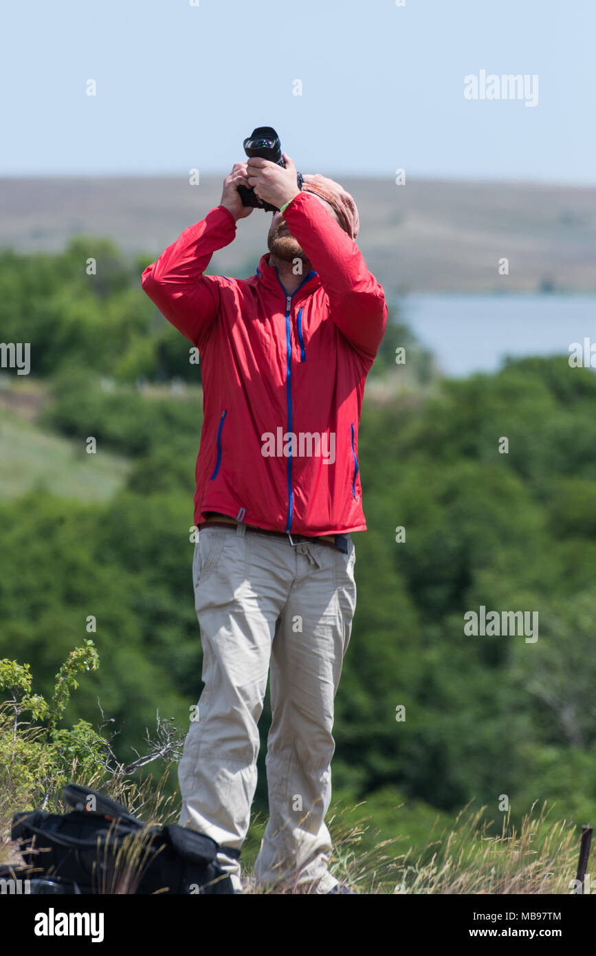 Male photographer at work Stock Photo