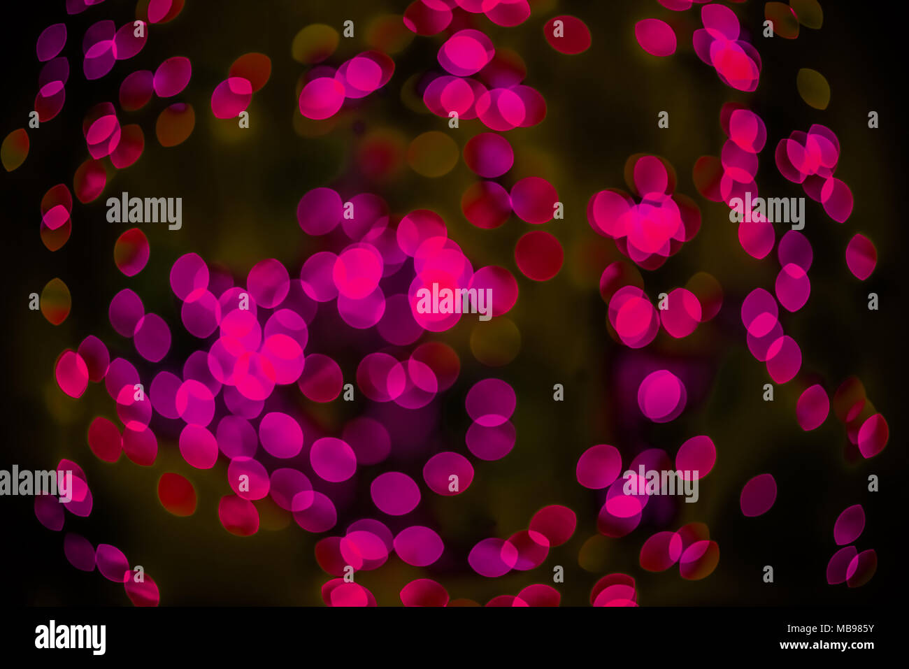 Bokeh background glowing oval shaped glow bright pink empty Stock Photo