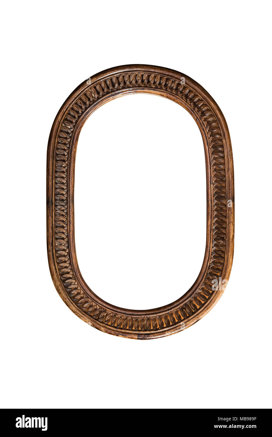 Wooden mirror frame border old oval brown on white background single one aged classic traditional decorative antique unique style. Stock Photo