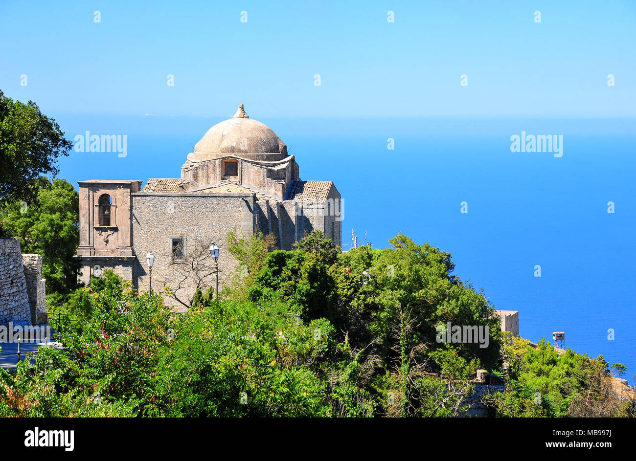 The Church of St. John the Baptist perches on a mountainside, in the