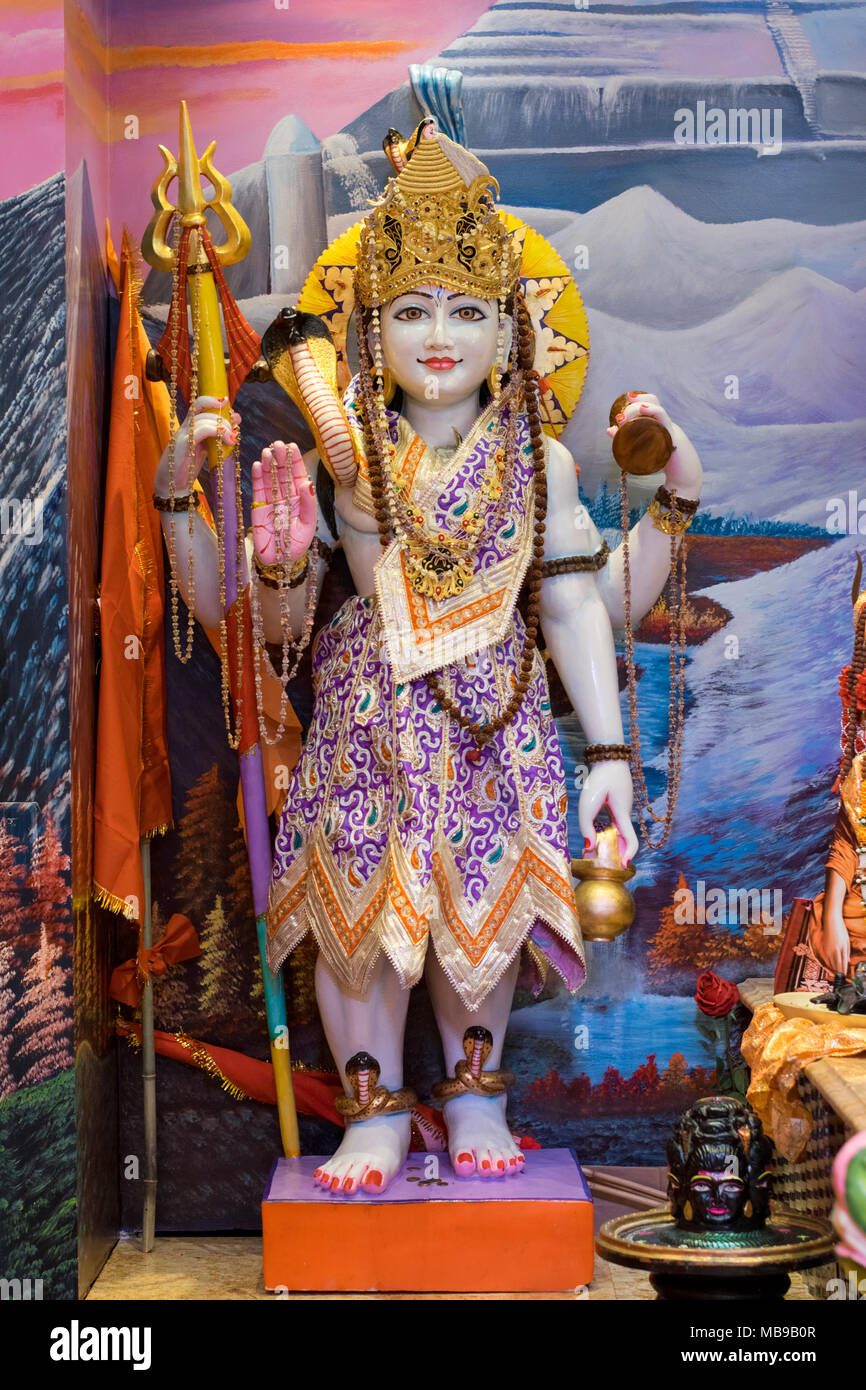 A large statue of the Hindu God Shiva, the god of destruction, at the Tulsi Mandir temple in South Richmond Hill, Queens, New York. Stock Photo